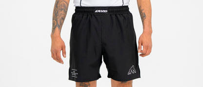 Rashguard Relentless Manga Larga blanca + Short Relentless Negro
